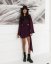 Elegant Mini Dress with Cut-Out Detail and Flowing Sleeves